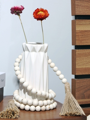 wood bead garland and vase